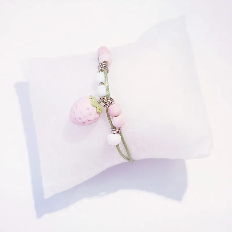 

ins ceramic bracelet rope braided female student Korean version of Mori girlfriends strawberry cute jewelry gift ancient style n