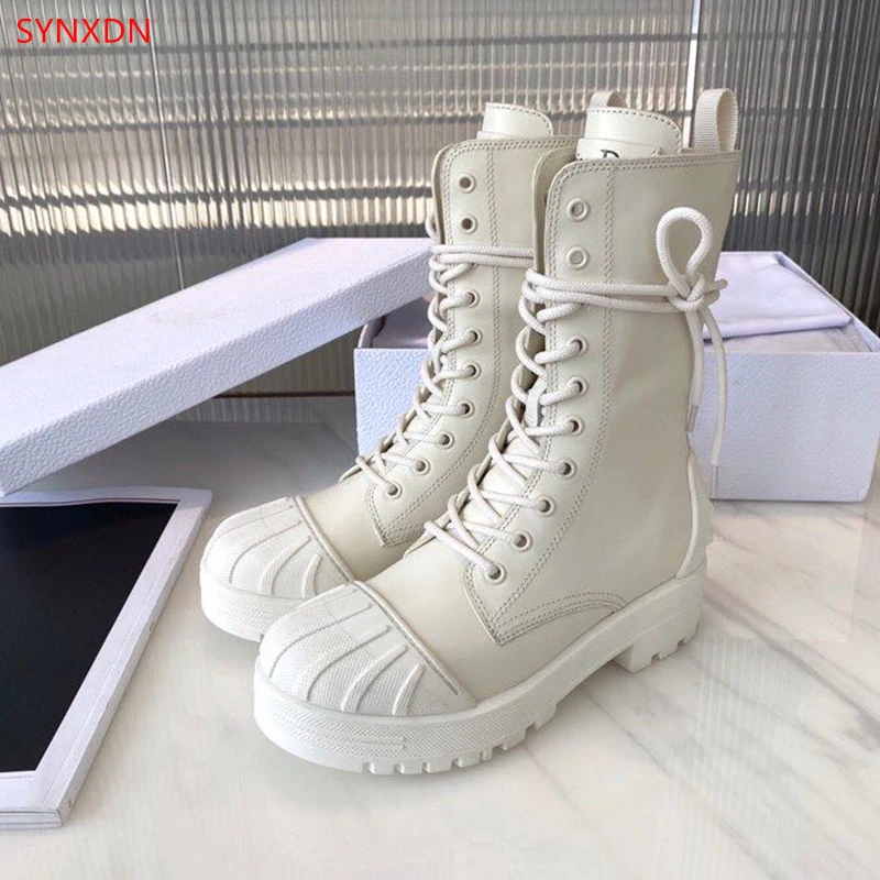 

Женские ботильоны из натуральной кожи на толстой подошве