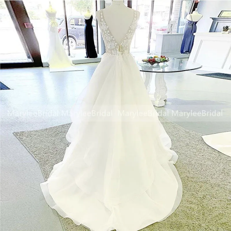 

Appliqued Deep V-Neck Wedding Dresses See Through Bodice Sweep Train Tiered Tulle Bridal Dress Backless Long Robe De Mariee
