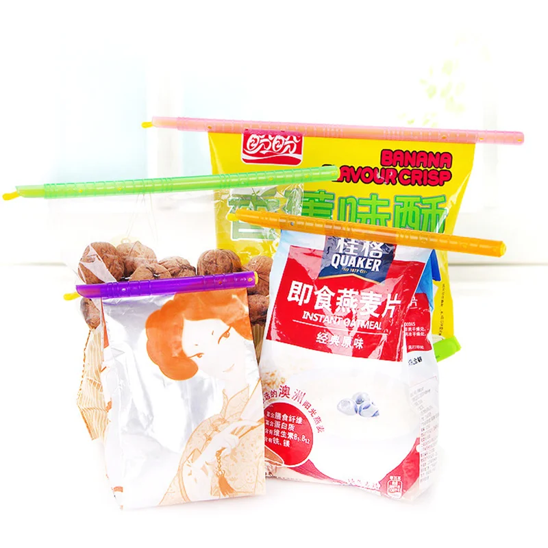 

Plastic Bag Mini Sealer Reuseable Bag Clip Type Moistureproof Sealing Machine Portable Storage （Random Color）