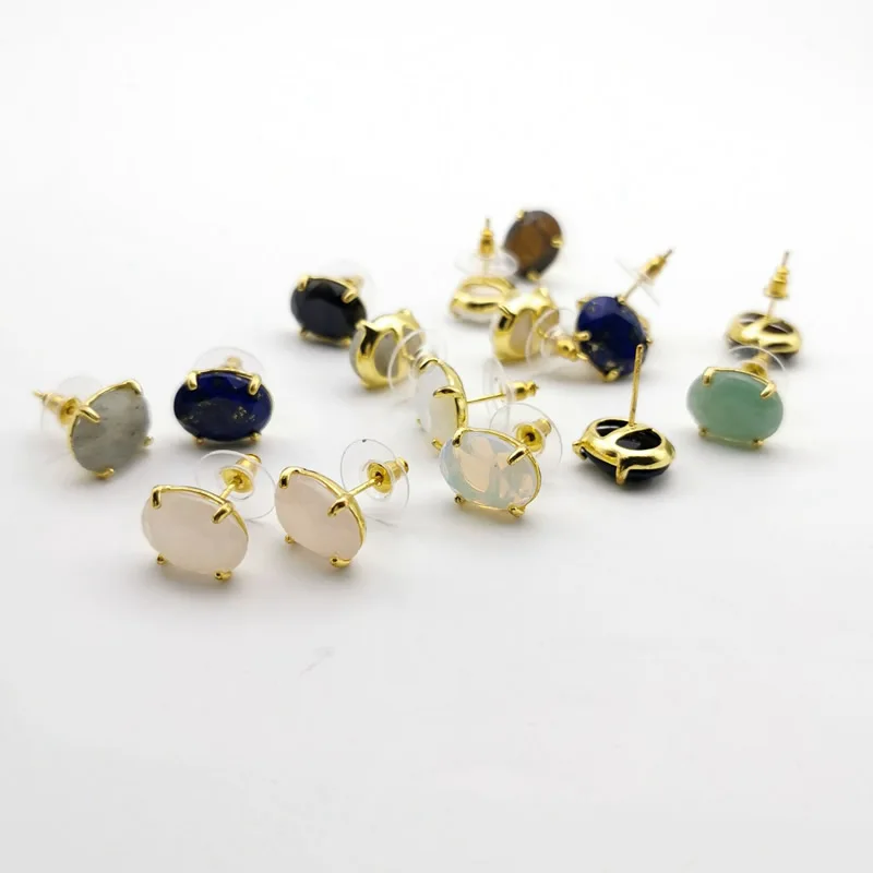 Серьги-гвоздики овальной формы с натуральный серебристый цвет камнем ограненные