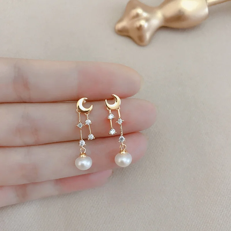 

Natural Freshwater Pearl Earrings Female Long Temperament Tassel Earrings Female High Sense Star and Moon Zircon Earrings Female