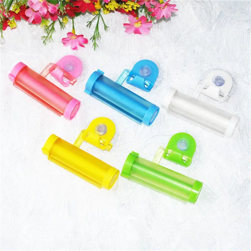 

5 Colors Creative Rolling Squeezer Toothpaste Dispenser Tube Partner Sucker Hanging Holde distributeur dentifrice 1 PCS