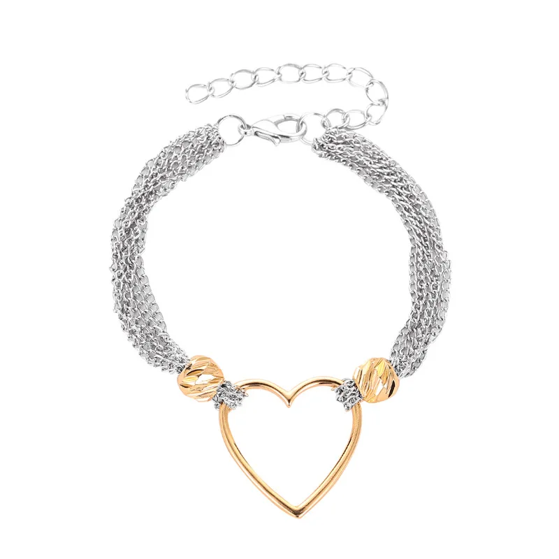 

Jewelry 100pcs / lot Europe fashion multi-layer chain love bracelet female cold wind hollow peach heart sushi hand ornaments