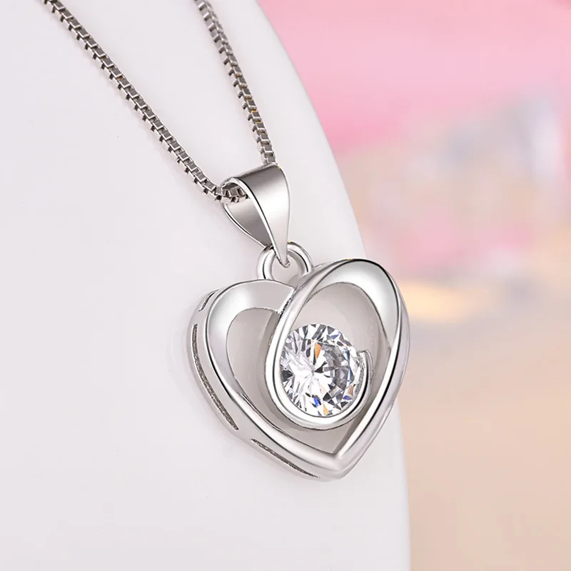 Модное ювелирное ожерелье вращающееся в форме сердца Подарочный кулон Лидер