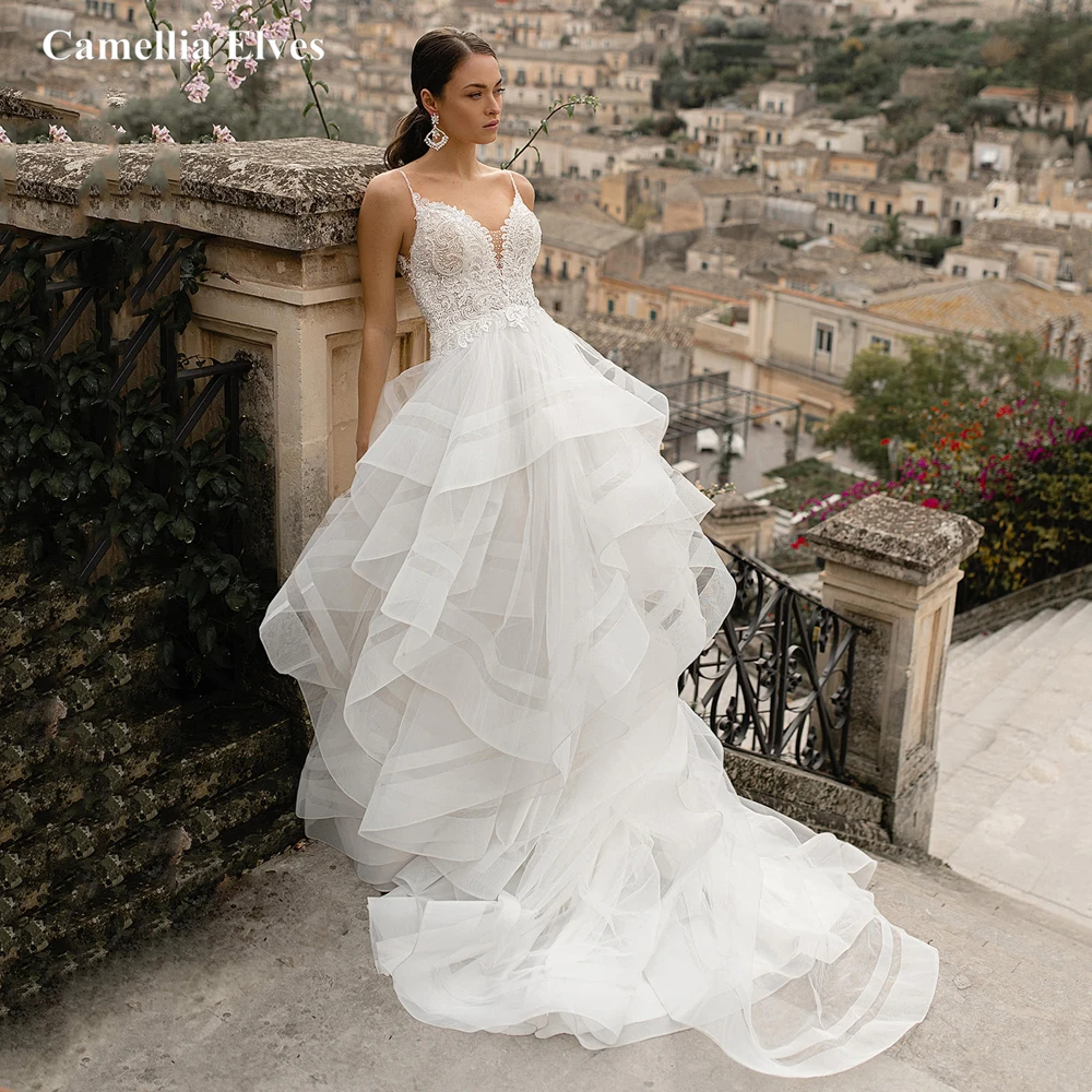 

Sexy Spaghetti Straps Wedding Dress Tiered A Line Bride Dresses Lace Appliques Backless Modern Bridal Gown Vestidos De Novia