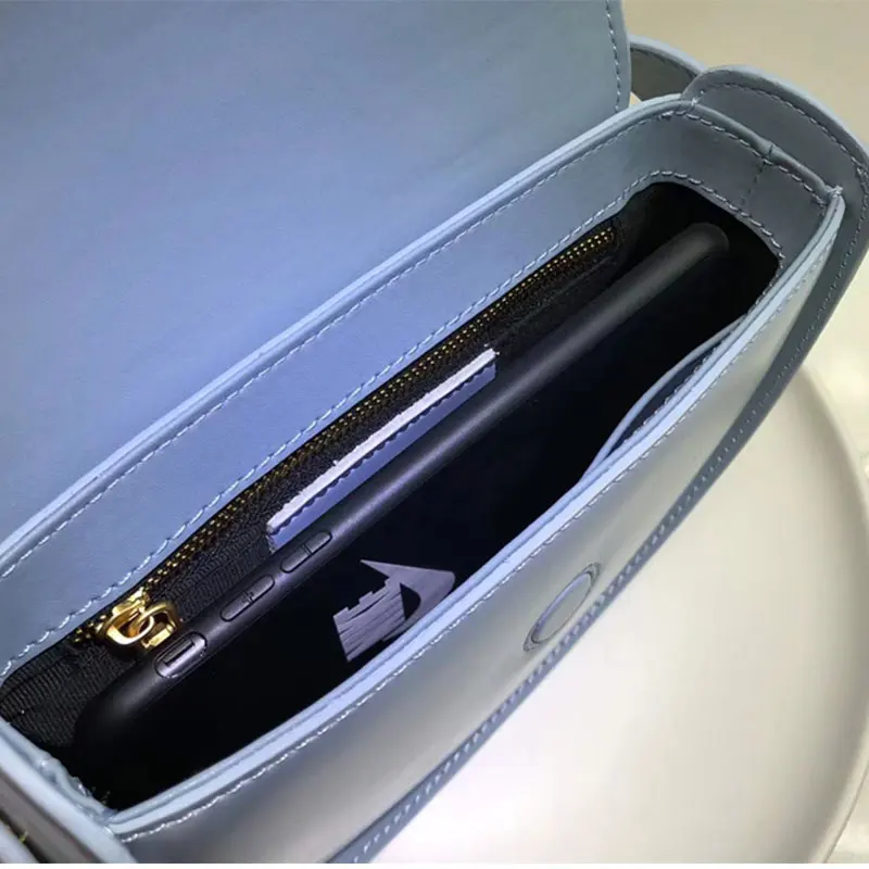 

2021 spring and summer new trend solid color leather handbags niche fashion texture semicircle bag saddle bag shoulder messenger