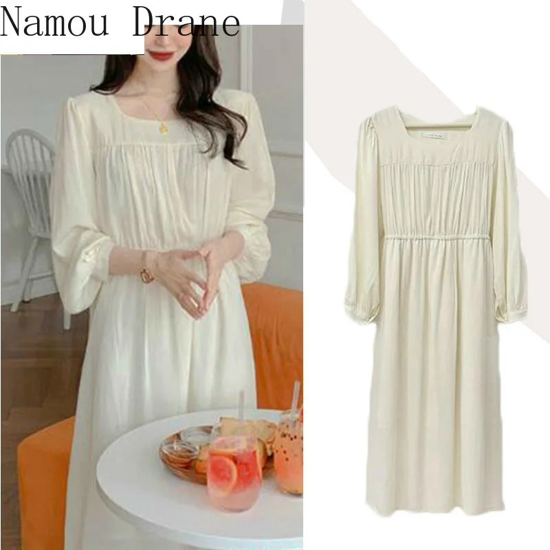 Женское винтажное платье с бантом длинное мягкое бежевого и белого цвета в