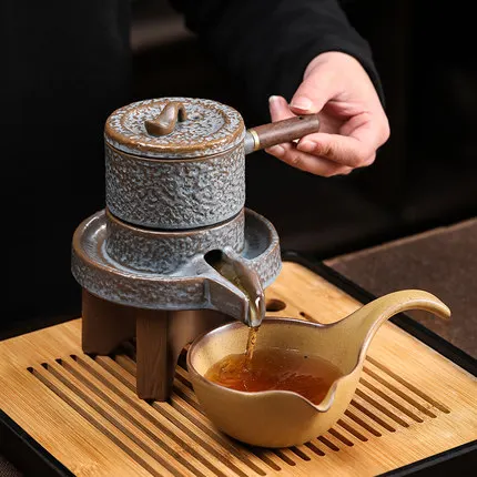 

Керамический чайный набор с ленивым камнем, Вращающийся Чайник для воды, китайский Ретро кунг-фу Да Хун Пао, зеленый чай, чайная посуда, чайн...