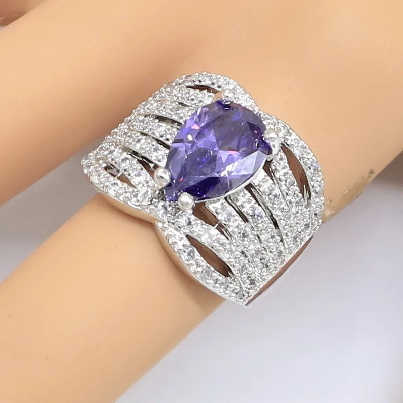 Искусственный роскошный браслет серебряного цвета с фиолетовым цирконом