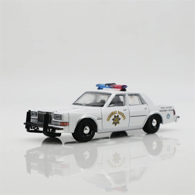 

Greenlight 1:64 1988 Dodge Diplomat California Highway Patrol Diecast Model Car Loose