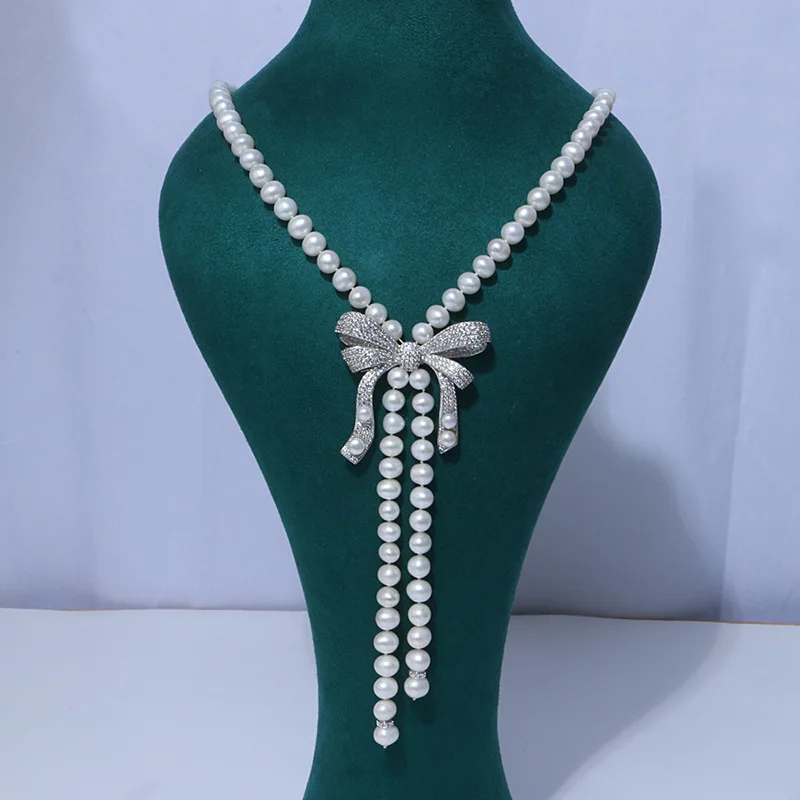 

Personalized creative freshwater pearl bow sweater necklace 210325-20