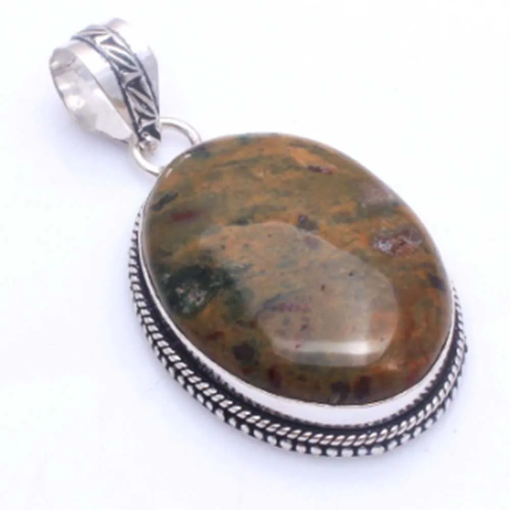 

Genuine Rhyolite Jasper Pendant Silver Overlay over Copper , 55 mm, P11876
