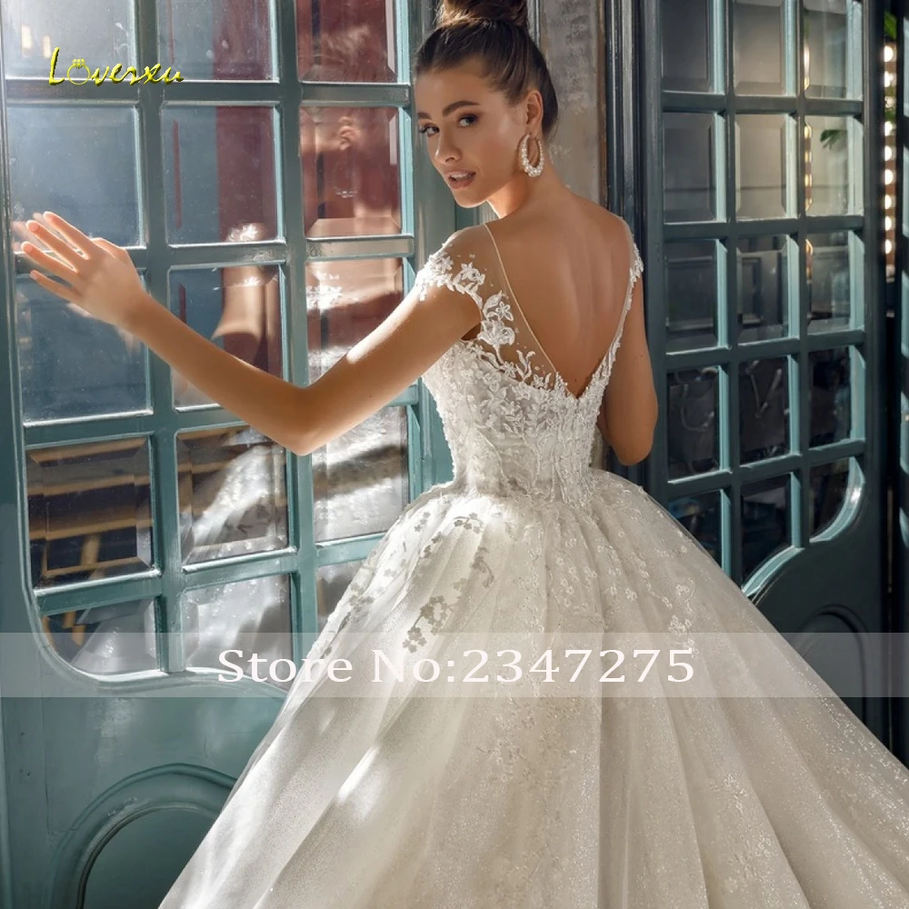 

Loverxu Sexy Backless Long Sleeve Lace Ball Gown Wedding Dresses 2019 Luxury Appliques Beaded Court Train Vintage Bridal Gowns