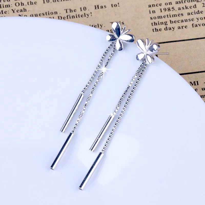 

New hot selling simple fashion bow silver plated retro tassel earrings