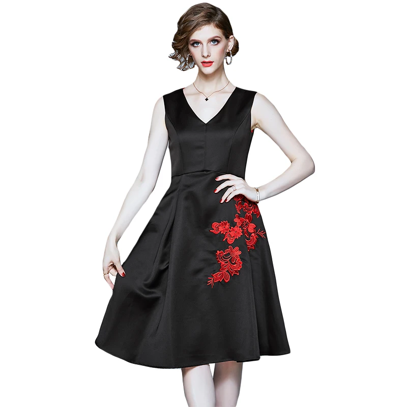 

The new posed temperament v-neck embroidery fashion dress