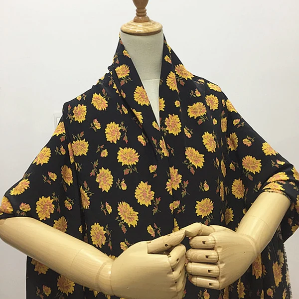 

Yellow floral print on black pure silk crepe de chine fabric 17momme 138cm width,SCDC1174