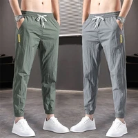 big size ice silk pants mens summer thin section trendy loose casual pants sports pants quick drying harlan nine point pants