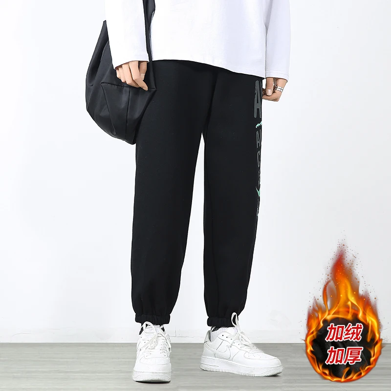 

Winter 2020 men's slacks thickened solid color cartoon printing casual thickened fashionable sports pants large size M-5XL