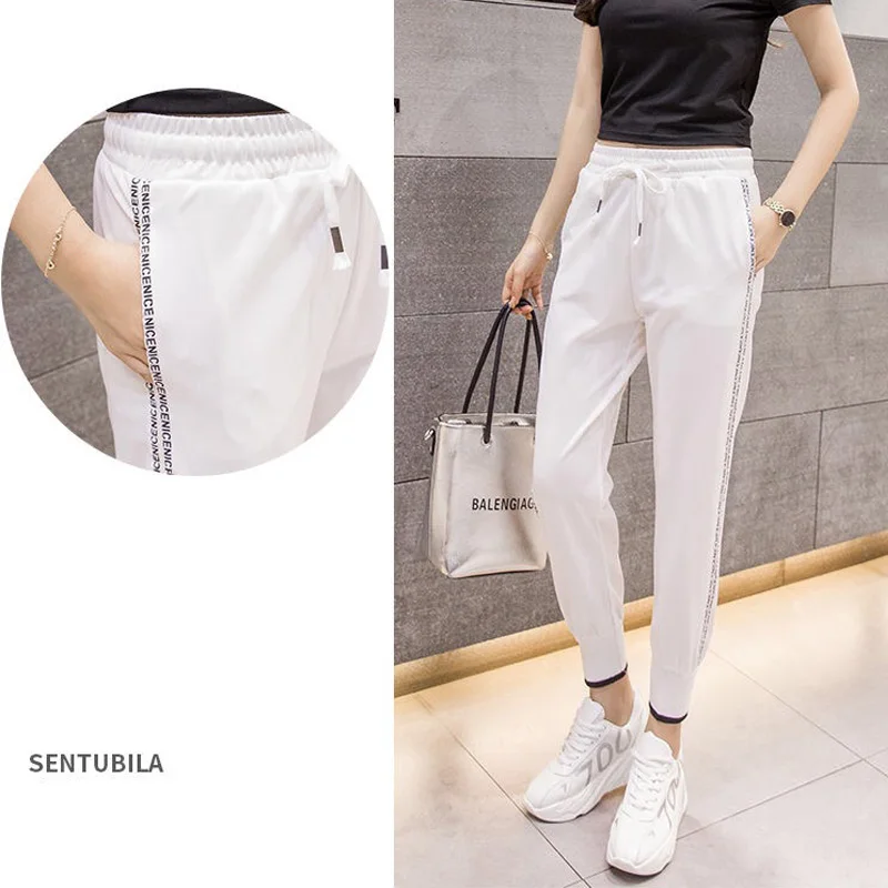 Женские белые спортивные брюки повседневные с высокой талией и разрезом