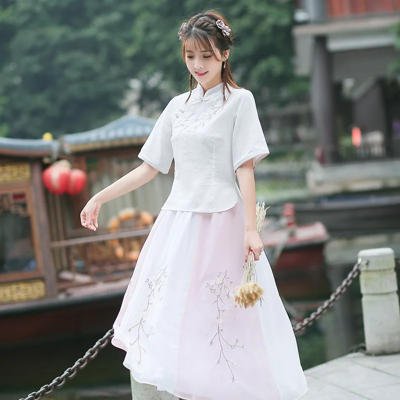 

Oriental clothing Ethnic style embroidered women's 2020 summer cotton and linen shirt chiffon color matching skirt suit