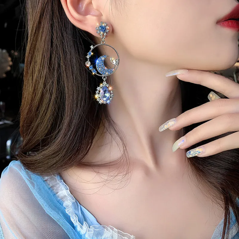 

The New Blue Ocean Star and Moon Fashion Asymmetrical Temperament Exaggerated Earrings