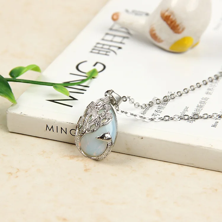 Подвеска в виде капли воды из натурального разноцветного кристалла