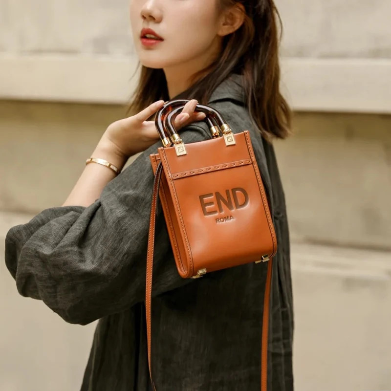 

2021 New F Home Sunshine Mini Amber Handle Portable Crossbody Tote Bag Vintage Genuine Leather One Shoulder Phone Bag Female Hot