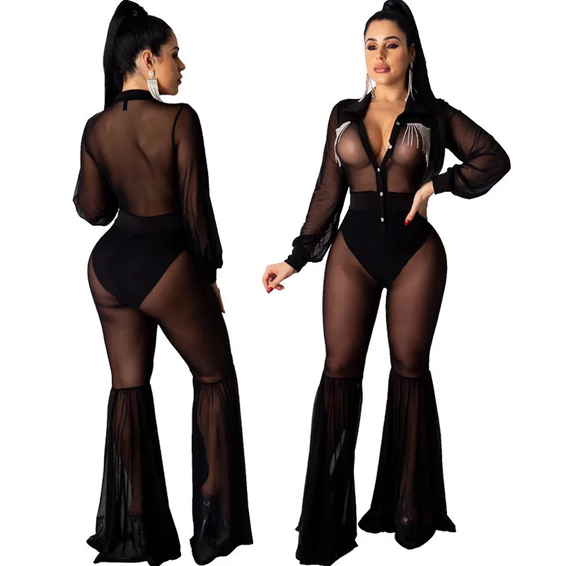 

Adogirl 2020 Spring Crystal Tassel Sheer Mesh Flare Jumpsuit with Panties Turn Down Collar Long Sleeve Shirt Night Club Romper