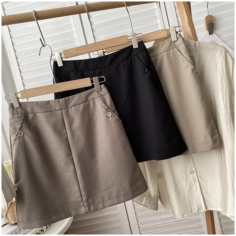 Длинная юбка с карманами на пуговицах привлекательная в гонконгском стиле