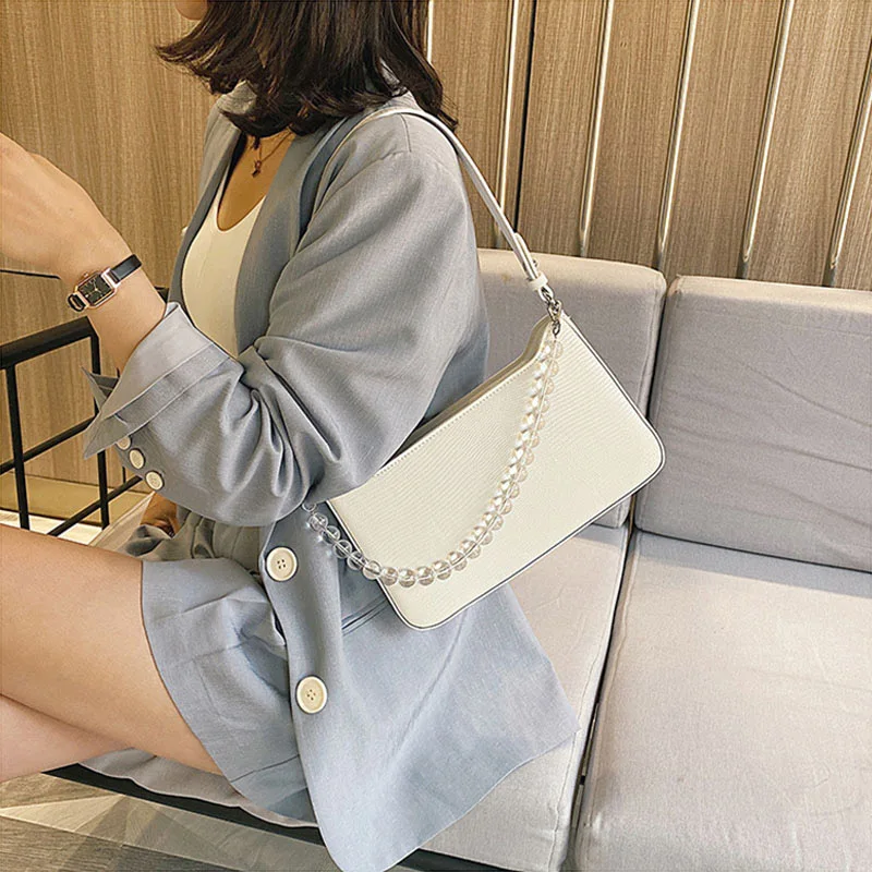 

Designer Pearl Chain Shoulder Bags For Women 2020 New Ladies Armpit Bag Fashion Ms Handbags Travel Beach Bag Evening Bags Female