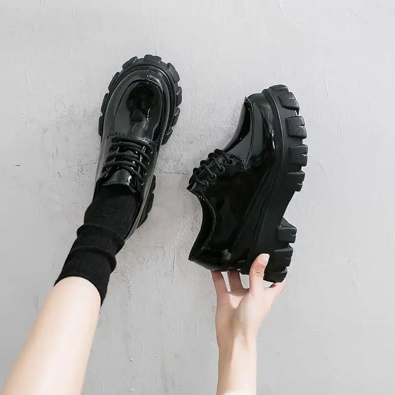 

same patent leather shoes with thick soles