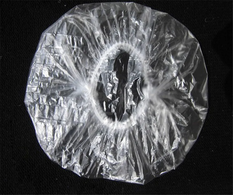 

New 100 pcs/pack Clear Hair Salon Shower Caps Disposable Spa Home Shower Bathing Elastic Cap