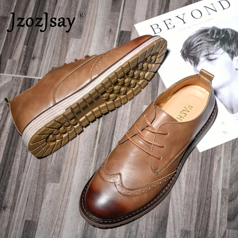 Мужские туфли броги с резным кружевом классические черного цвета деловые