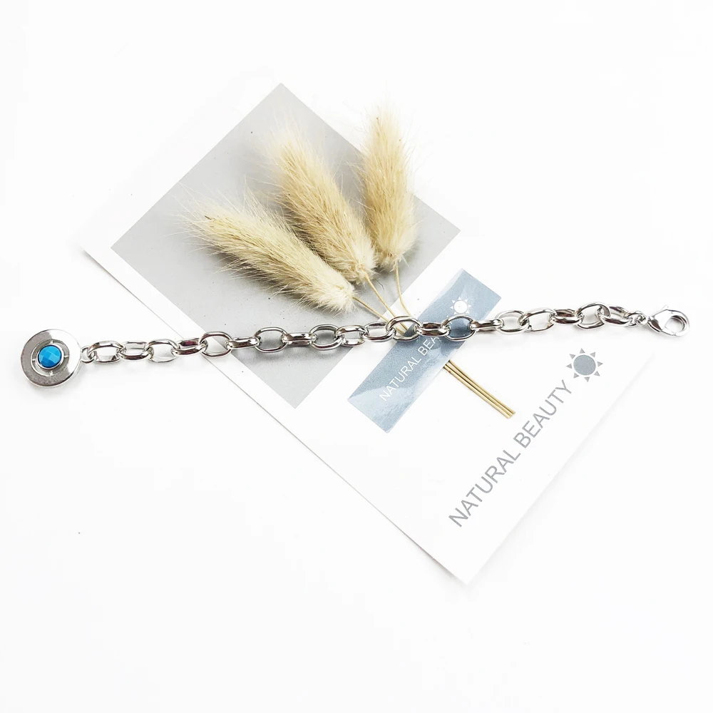 Браслет подвеска с голубым камнем и застежкой лобстером ювелирное изделие в