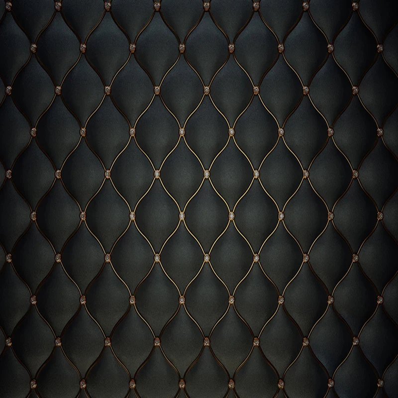 черно золотая кожа. черно золотая кожа. золото текстура. кожаная обивка. золото на черном фоне.