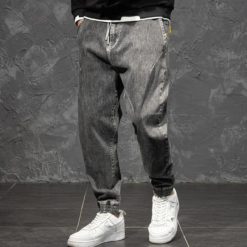 Брюки султанки мужские свободные Стрейчевые джинсовые брюки модные осенние