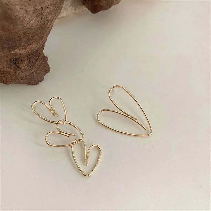 

New Christmas Sweet Gift Korean Fashion Asymmetric Hollow Wire Heart Earrings Ladies Gold Earrings For Lady OL Accessoires