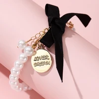 elegant nobility black wine red color bow imitation pearl bracelet round letter bracelet for women girls party christmas jewelry