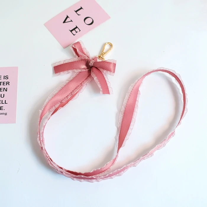 Цепочка с длинными лентами кисточками и искусственным жемчугом|Брелоки| |