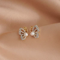 new temperament is simple hollow design sense earrings net red small set butterfly pearl earrings