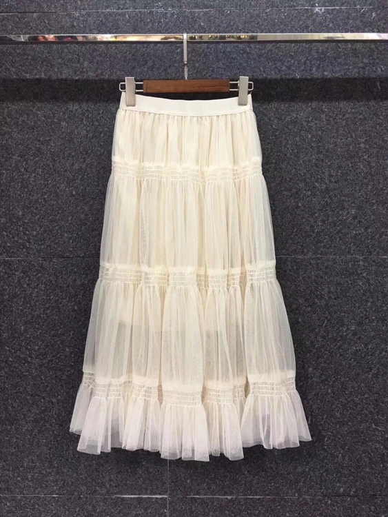 

2020 autumn and winter new fashion women's elastic waist solid color decoration pleated mesh stitching mid-length skirt 12