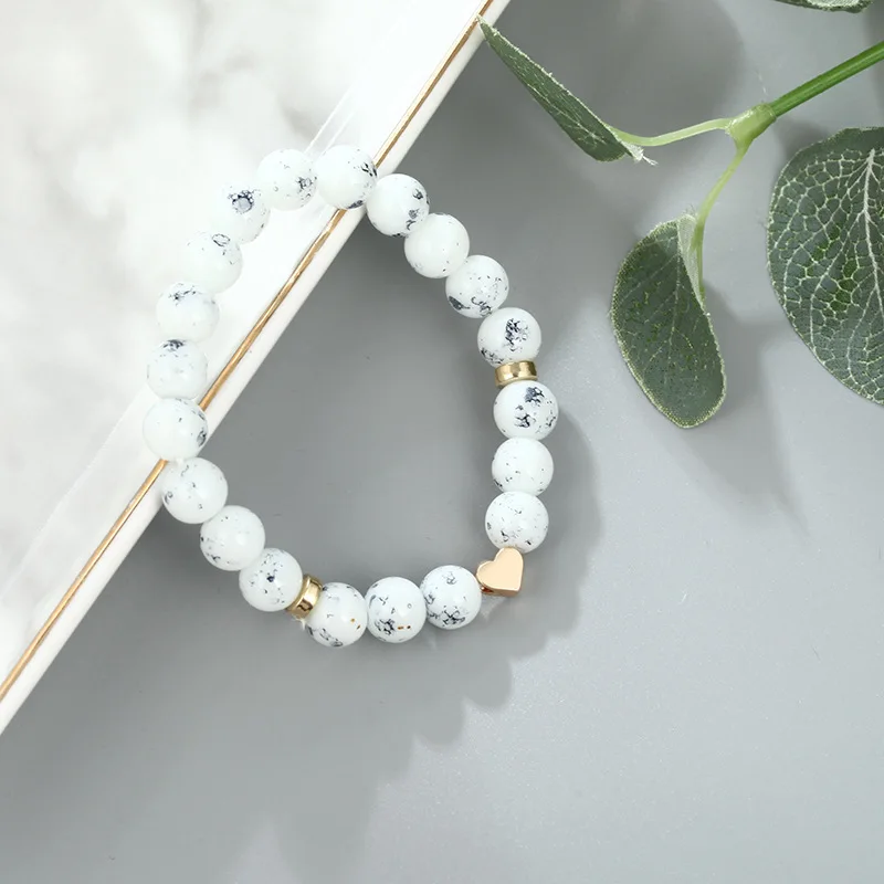 Simple and creative geometric hollow metal round piece turquoise love tassel pendant bracelet four-piece set | Украшения и