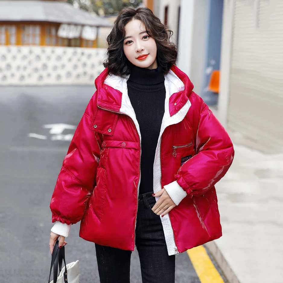 

Новая женская глянцевая зимняя куртка-пуховик 2022 год Повседневная мода с капюшоном Однотонный средний длинный Прямое свободное пуховое па...