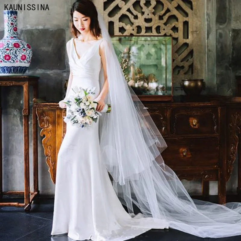 

KAUNISSINA Wedding Dress Romantic Sleeveless Bride Gown Floor-Length White Satin Bride Dresses Deep V-Neck Sexy Vestido de Noiva