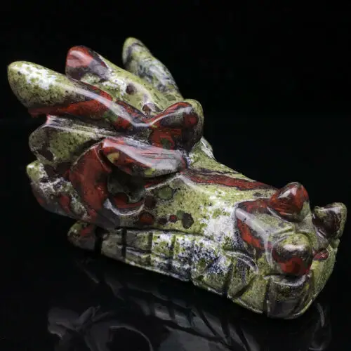 

Natural Dragon Blood Dragon bone quartz crystal carved skull healing statue