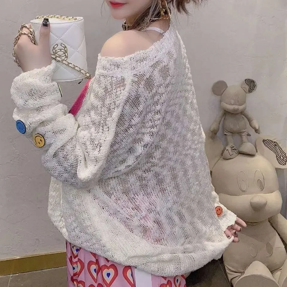 

2021 Summer Cartoon Smiley Face Hollow Knit Blouse Female Korean Version Loose and Gentle Lazy Wind Long-sleeved Pullover Top