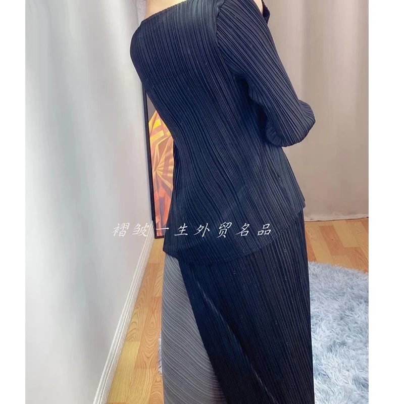 

2021 spring new women's suit Miyak fold Fashionable high-elastic color matching shirt + half skirt two-piece suit Round neck