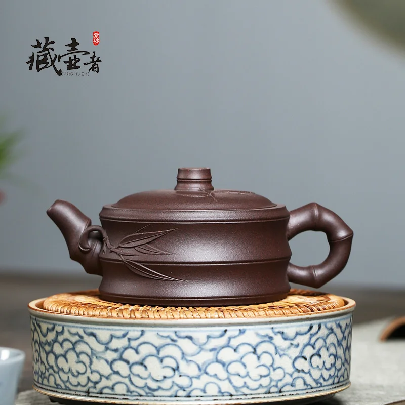 

Yixing purple clay teapot master hand made bamboo teapot