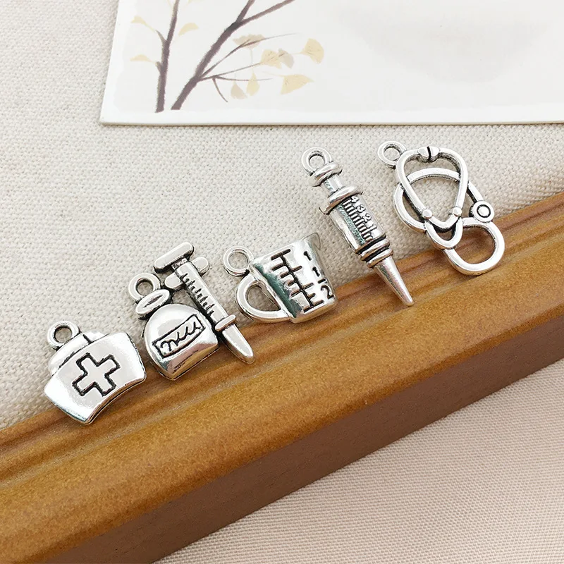 

30/50Pcs Mix Medical Appliances Jewelry Making Pendant Nurse Hat Stethoscope Charms Bracelet Earrings Necklace Pendant 6x20MM
